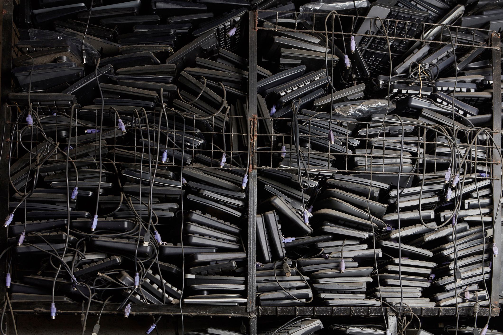Stacks of old, aging laptops
