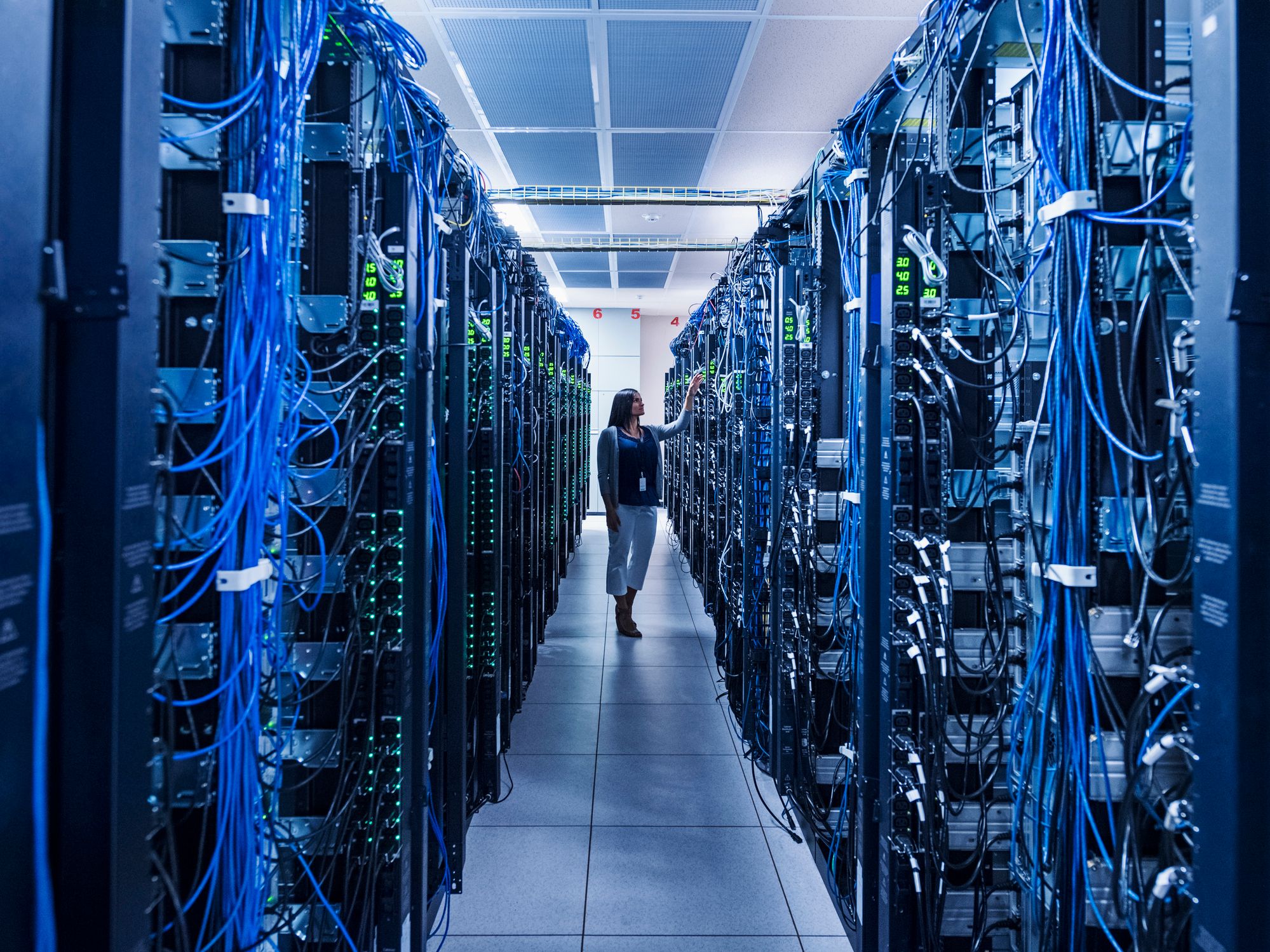 Single woman working in a data center