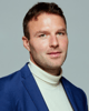 Headshot of Simon Harrsen, Executive Vice President North America