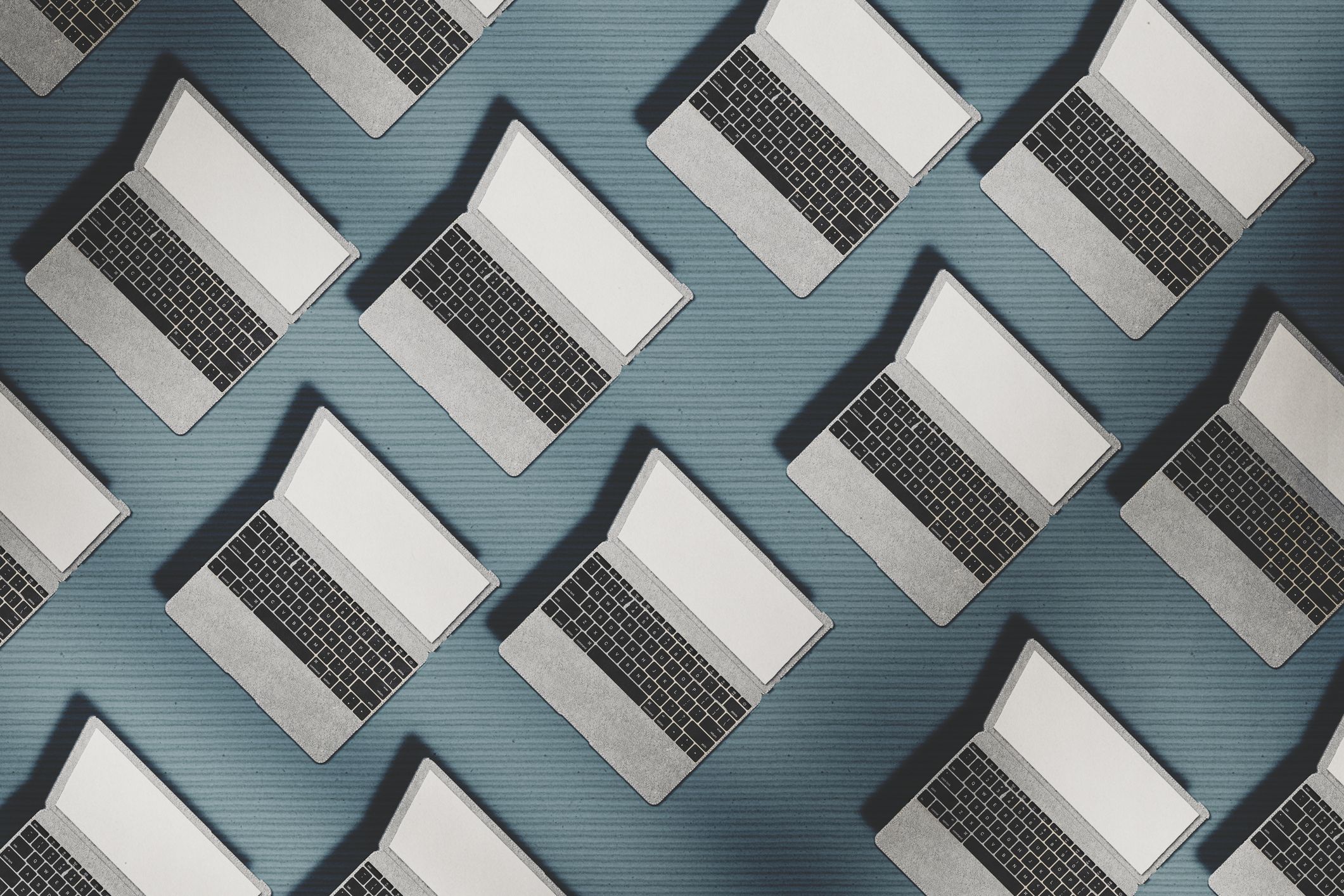 An abstract of a group of laptops shot from birdseye